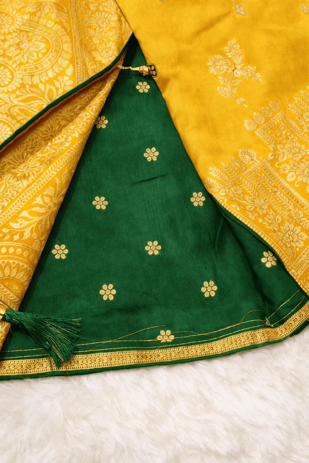 Yellow Premium Silk Saree with Golden Zari Weaving and Mirror Work with Contrast Green Blouse Piece